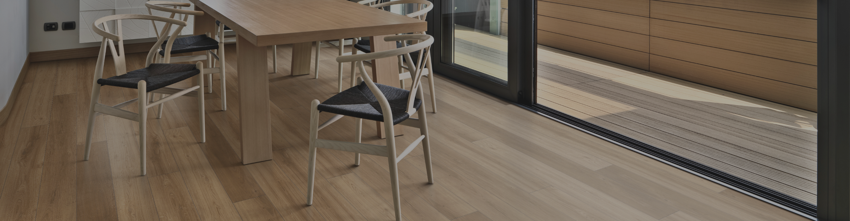 hardwood flooring in an indoor/outdoor seating area